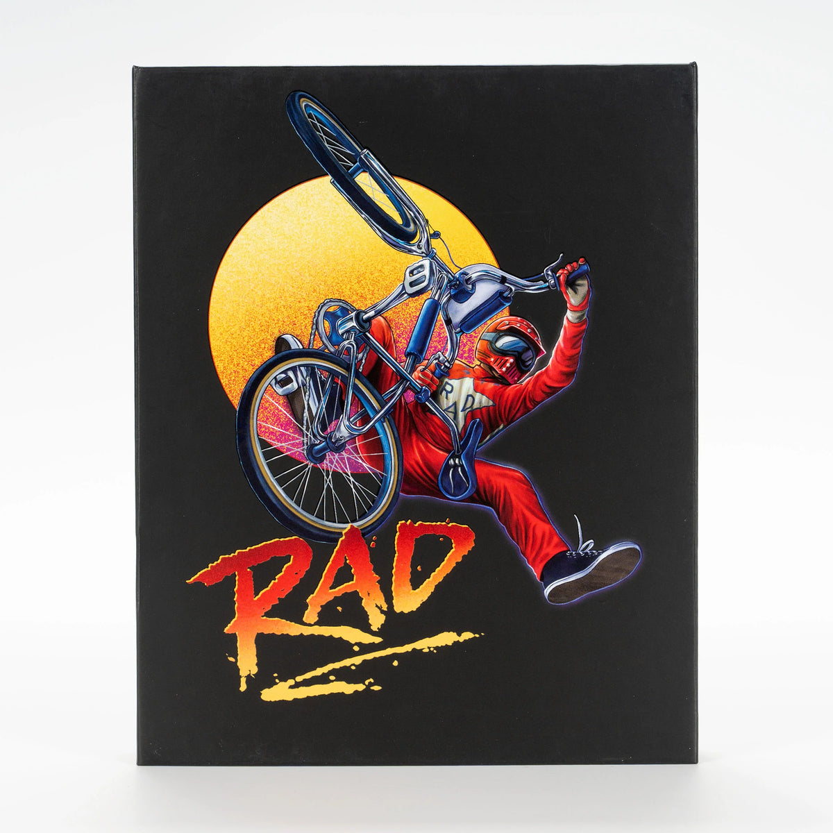 PRE-ORDER: Rad with Limited Edition Deluxe Box 3-disc Set: 4K Ultra HD / Region A Blu-ray x2 (Vinegar Syndrome Ultra)